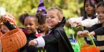 Multi-ethnic children dressed in Halloween costumes